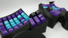 Load image into Gallery viewer, Black Dactyl w/ 67g Zealios and Purple/Blue SA Keycaps